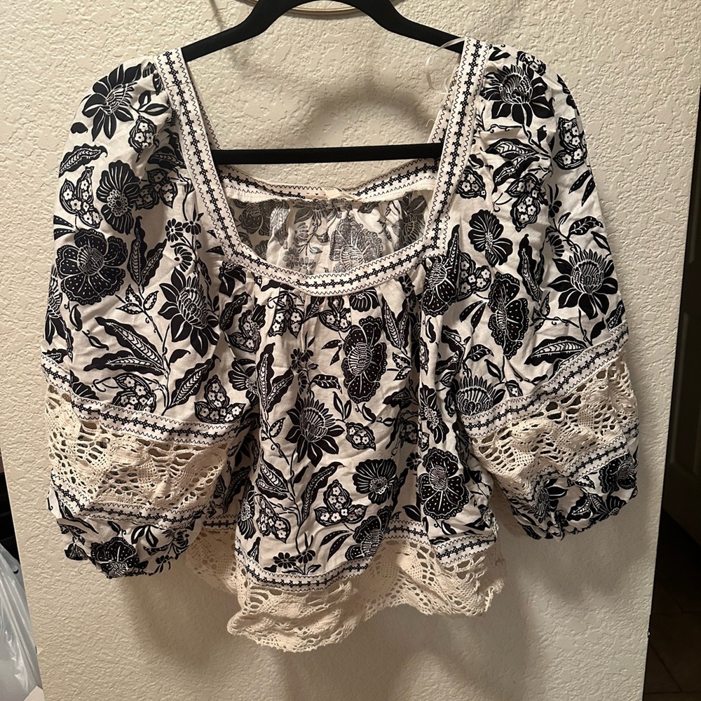 Cream and black blouse